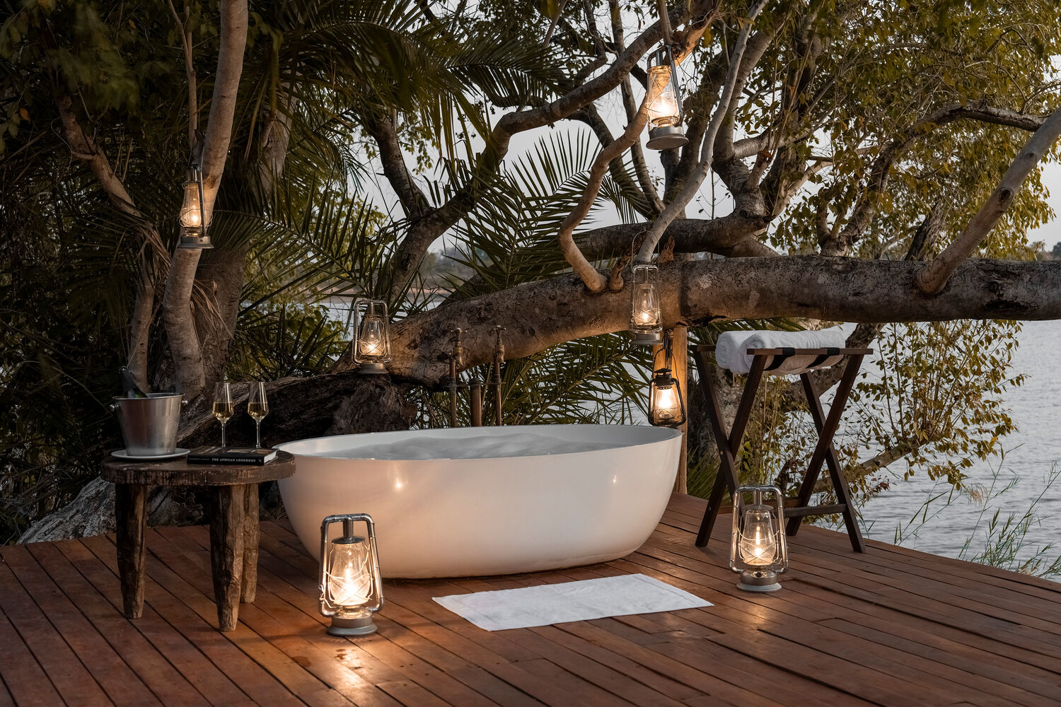 Open-air bathtub on a private deck at Ila Safari Lodge in Kafue National Park, Zambia