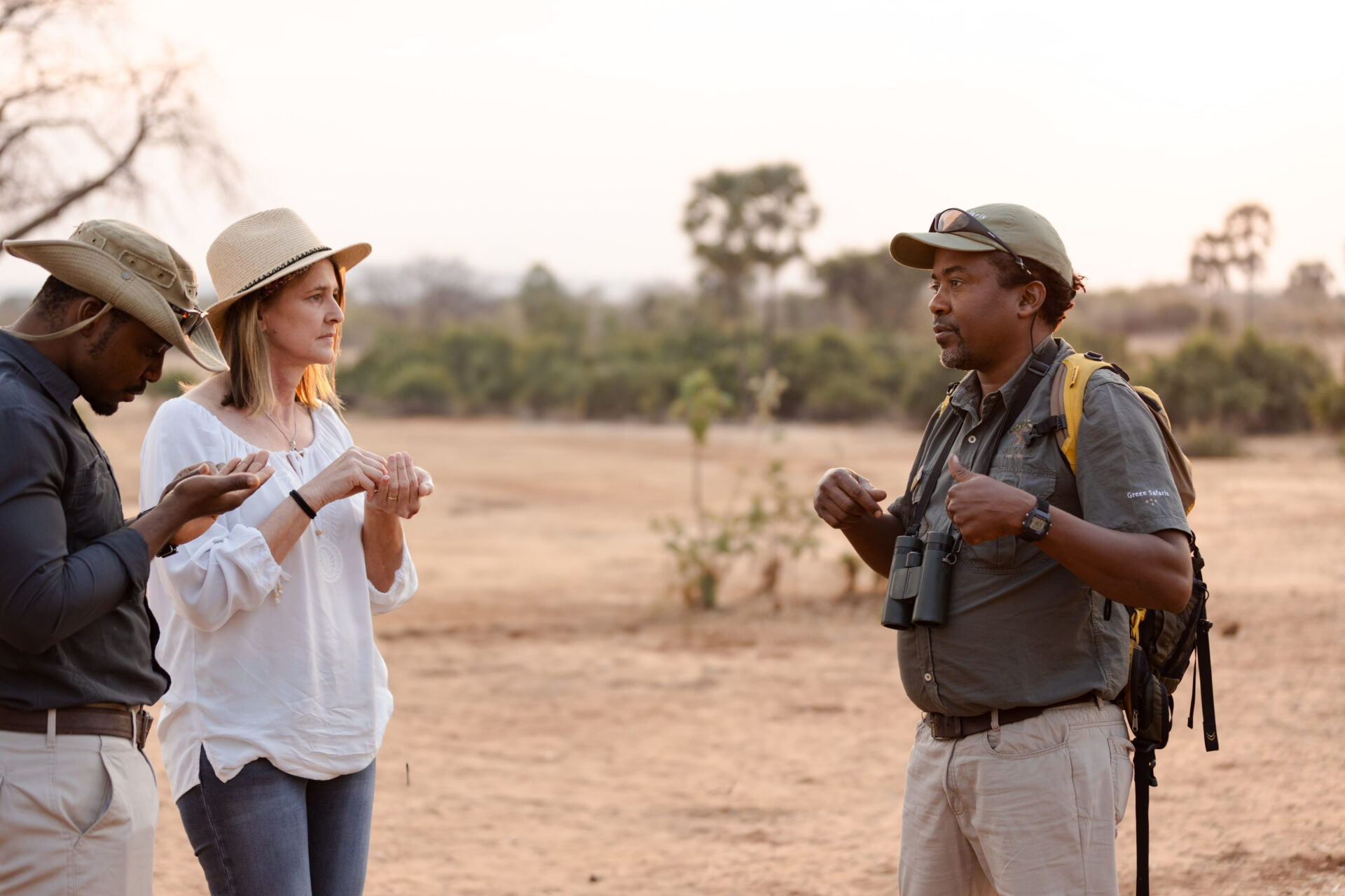 Guide leading guests on a walking safari across the floodplains of Lower Zambezi National Park